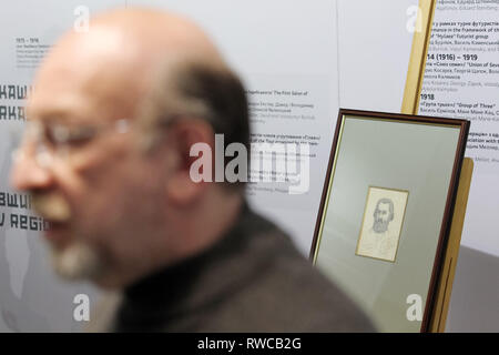 March 6, 2019 - Kiev, Ukraine - Art historian EDUARD DIMSHITZ speaks to media, during presentation the painting of self-portrait by Russian artist Kazimir Malevich, at the opening of the exhibition ''Avant-garde. In search of the fourth dimension'' in the center of modern art ''M17'' in Kiev, Ukraine, on 06 March 2019. According to representatives the M17, for the first time in Ukraine presented a previously unseen self-portrait by Russian artist Kazimir Malevich, which he painted 11 months before his death. ''Now i look like Marx in a grave. When I go out, the children shout Karl Marx,'' sign Stock Photo