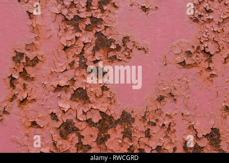 red color painted peeled rusty metal background texture Stock Photo