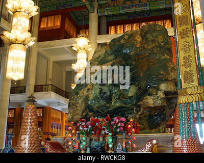 Jade Buddha Palace. Backside of the Anshan Jade Buddha in The Mahavira Palace, Jade Buddha Park, Anshan, Liaoning Province, China. Stock Photo