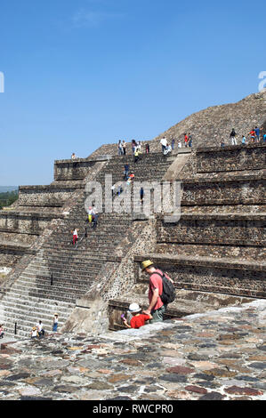 Tourists climbing up and down the steep stairs on the Pyramid of the Moon at Teotihuacan, Mexico Stock Photo