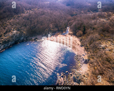 Aerial view over a small bay with a wild beach, located in the forest, Paraskeva Bay, Bulgaria Stock Photo