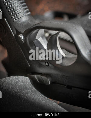 pistol laying on a table Stock Photo