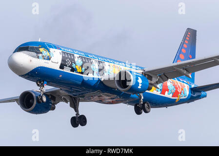Brussels Airlines Airbus A320 Aerosmurf jet plane airliner OO-SND landing at London Heathrow Airport, UK. Smurf special scheme Stock Photo