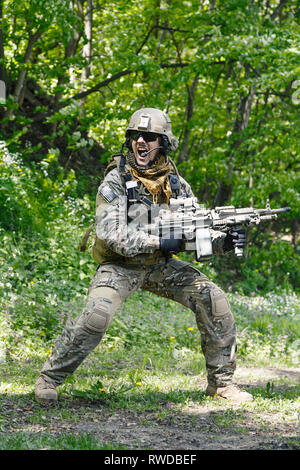 Green Berets U.S. Army Special Forces Group soldier in action. Stock Photo