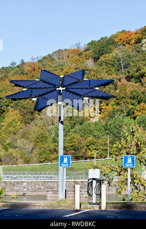 Electric Vehicle Charge Station, Solar Array Panels, identified as 'Solar Voltaic Flair',  17 ft. in diameter, weighing approx. 1200 lbs. Stock Photo