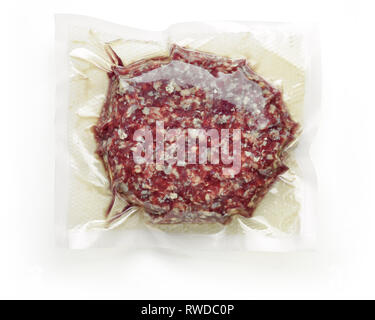 Burger meat vacuum sealed ready for sous vide cooking isolated on white background, top view Stock Photo