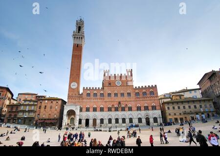 Siena, Italy - 03 March, 2019: Piazza del campo in the Tuscan city, near Florence in Italy. The square is famous all over the world as the famous Pali