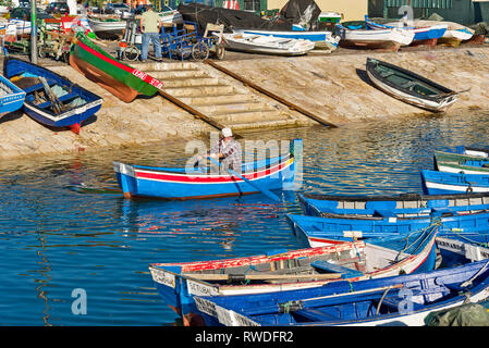 small colorful fishing boat in the port of Setubal, Portugal Stock Photo