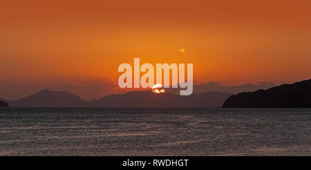 Setting sun over the Andaman sea, Thailand Stock Photo