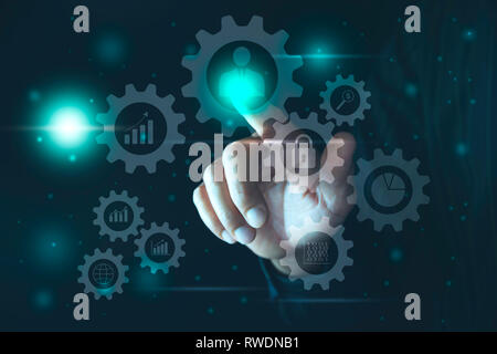 Hand click on virtual touchscreen button. Hand pressing modern buttons. Man hands pressing virtual screens technology concept. Stock Photo