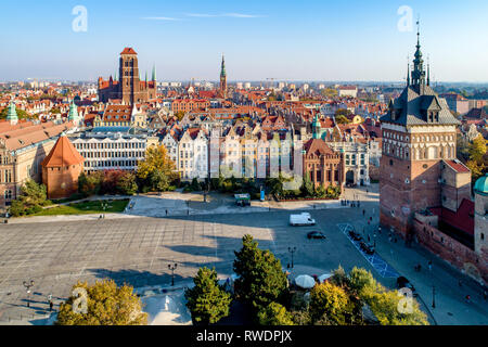 Gdansk, Poland. Old city skyline with Prison Tower, St Mary church, town hall tower, Golden Gate and  Coal Market square (Targ Weglowy).  Aerial view  Stock Photo