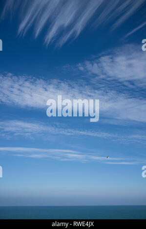 Cirrus and cirrocumulus clouds in a blue sky over South Devon in Spring, UK Stock Photo