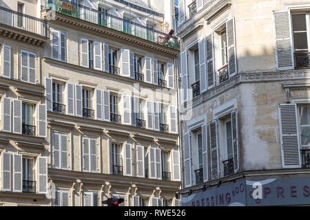 Paris apartments with wooden shutters on the windows in the sunshine ,Rue Notre Dame de Lorette,St Georges in the 9th arrondissement of Paris Stock Photo