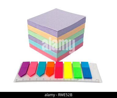Pile colored block of post notes and stickers with a ruler, closeup Stock Photo