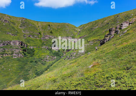 Alien, rocky, sunlit landscape and almost dried up Kopren waterfall on Old (Balkan) mountain in Serbia Stock Photo