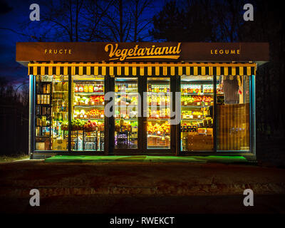 CHISINAU, MOLDOVA-MARCH 5, 2019: Vegetarian fruit shop at night (inscription in romanian: fruits, vegetables, vegetarian) Stock Photo