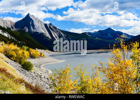 The Maligne mountain range and Medicine Lake in Jasper National Park near Jasper, Alberta. Stock Photo