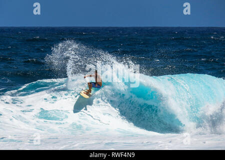 Surfer Man Surfing Wave at Cloud 9 - Siargao, Philippines Stock Photo