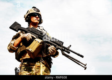 Low angle portrait of U.S. Army Ranger with machine gun. Stock Photo