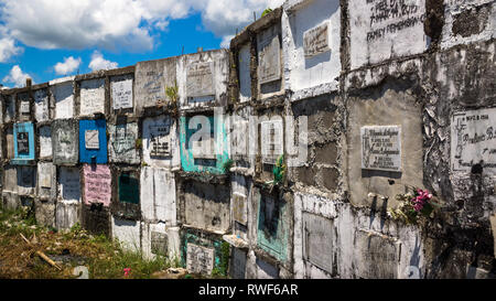 Cement Graves Stacked Above ground in Tropics - Catanduanes, Philippines Stock Photo