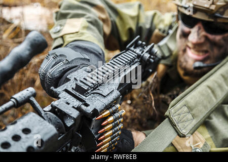 Norwegian Rapid reaction special forces FSK soldier reloading weapon. Stock Photo