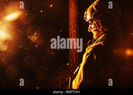 Soldier in Action at Night in the Forest Area. Night Time Military ...