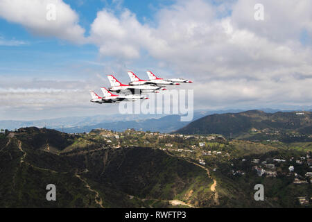 The United States Air Force Air Demonstration Squadron “Thunderbirds” perform a practice flyover for the Captain Marvel world premiere Mar. 4, 2019, Los Angeles, CA.  The flyover is a unique moment to honor the men and women serving in the Armed Forces who are represented in Captain Marvel.  (U.S. Air Force Photo/SSgt Ashley Corkins) Stock Photo