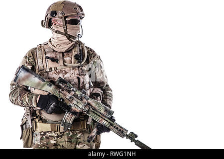 Half length portrait of special forces soldier in field uniform with weapon. Stock Photo