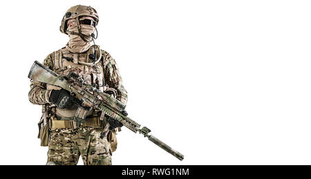 Studio shot portrait of special forces soldier in field uniform with weapon. Stock Photo