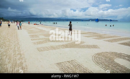 Large Words Raked Into Tropical Beach - Boracay Island, Panay - Philippines Stock Photo