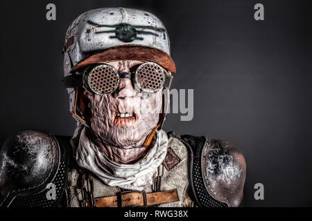 Post apocalyptic survivor with ugly face. Skin burned by atomic flame. Stock Photo
