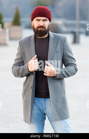 Achieve desired fit. Hipster outfit and hat accessory. Stylish casual outfit  spring season. Menswear and male fashion concept. Man bearded hipster  stylish fashionable coat and hat. Comfortable outfit Stock Photo - Alamy