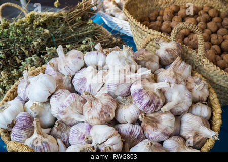 Basket of garlics outside shop in Setenil de las Bodegas, Cadiz Province, Spain. Stock Photo