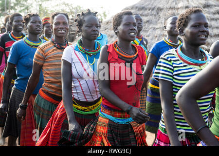 Traditional Karamojong dancing in a village, northern Uganda Stock Photo