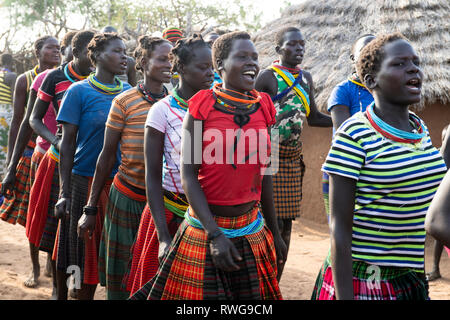 Traditional Karamojong dancing in a village, northern Uganda Stock Photo