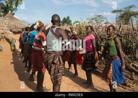 Traditional Karamojong dancing in a village, northern Uganda Stock Photo