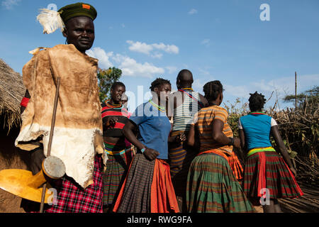 Traditional Karamojong dancing in a village, northern Uganda Stock Photo