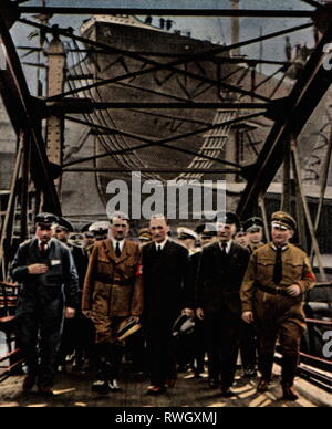 Hitler, Adolf, 20.4.1889 - 30.4.1945, German politician (NSDAP), Chancellor of the Reich 30.1.1933 - 30.4.1945, full length, visiting the dockyard of Blohm and Voss, Hamburg, 17.8.1934, coloured photograph, cigarette card, series 'Die Nachkriegszeit', 1935, Additional-Rights-Clearance-Info-Not-Available
