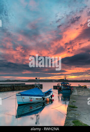 Sunset over Beadnel harbour Stock Photo