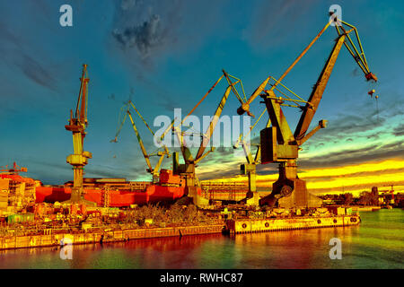 Big cranes in shipyard Gdansk, Poland. Stock Photo