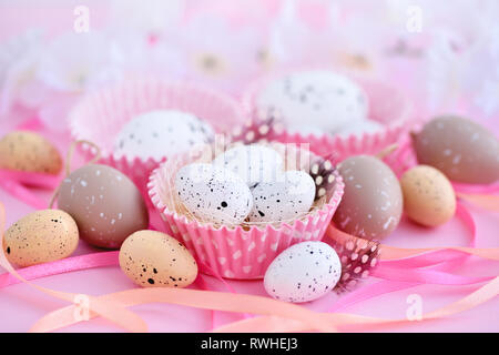 Festive easter background with eggs and ribbons Stock Photo