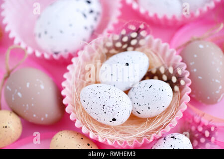 Festive easter background with eggs and ribbons Stock Photo