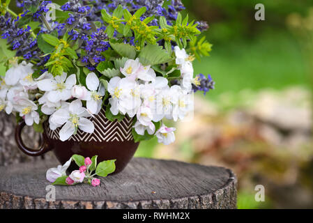 Bouquet of spring flowers on the natural background Stock Photo