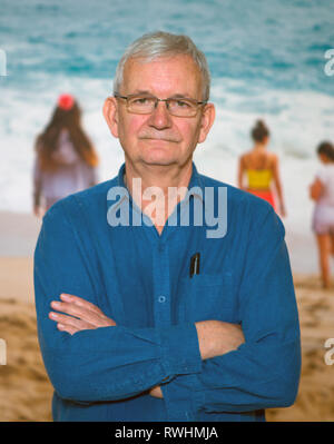 Magnum photographer Martin Parr stands with his work from Porthcurno, Cornwall. Stock Photo