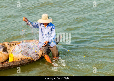 Local Vietnamese fisherman on small  boat  Tan Chau,, An Giang Province Mekong River, Vietnam, Asia Stock Photo