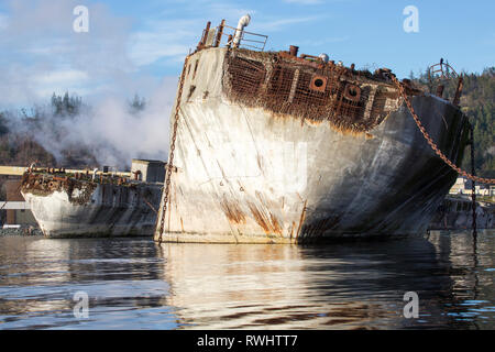 A concrete barge, used as a breakwater for Catalyst Paper's Mill in Powell River, British Columbia, Canada Stock Photo