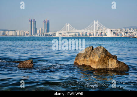 Gwangan Bridge and skyscrapers in Busan, South Korea Stock Photo