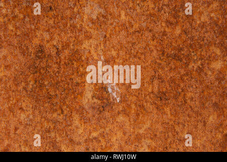 Old Distressed Brown Terracotta Copper Rusty Stone Background with Rough Texture Multicolored Inclusions. Stained Gradient Coarse Grainy Surface Stock Photo