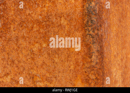 Old Distressed Brown Terracotta Copper Rusty Stone Background with Rough Texture Multicolored Inclusions. Stained Gradient Coarse Grainy Surface Stock Photo