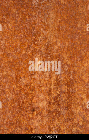 Old Distressed Brown Terracotta Copper Rusty Stone Background with Rough Texture Multicolored Inclusions. Stained Gradient Coarse Grainy Surface Stock Photo